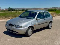 Usado Ford Fiesta 75 CV (55 kW) 1998 Gris / plata Utilitario