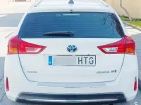 Usado Toyota Auris Hybrid Advance 136 CV (100 kW) 2013 Blanco Familiar