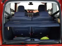 Usado Peugeot 1007 70 CV (51 kW) 2007 Rojo Monovolumen