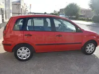 Usado Ford Fusion 100 CV (73 kW) 2003 Rojo Utilitario
