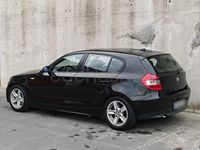 Usado BMW 118 122 CV (89 kW) 2006 Negro Utilitario