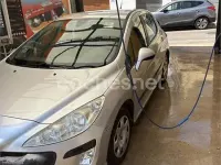 Usado Peugeot 308 Business-Line 92 CV (67 kW) 2011 Gris / plata Berlina