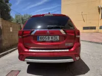Usado Mitsubishi Outlander P-HEV 203 CV (149 kW) 2017 Rojo SUV