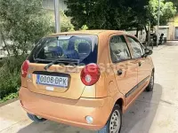 Usado Chevrolet Matiz 65 CV (47 kW) 2005 Naranja Utilitario