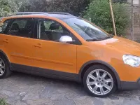 Usado VW Polo Cross 105 CV (77 kW) 2006 Naranja Utilitario