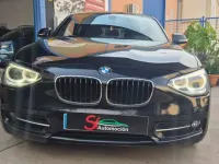 Usado BMW 116 116 CV (85 kW) 2012 Negro Utilitario