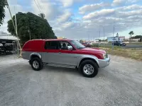 Usado Mitsubishi L200 114 CV (83 kW) 2004 Rojo Pickup/Camioneta