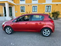 Usado Opel Corsa Selective 85 CV (62 kW) 2013 Rojo Utilitario