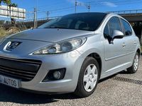 Usado Peugeot 207 70 CV (51 kW) 2010 Gris / plata Berlina
