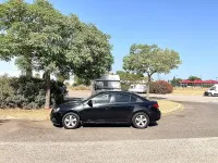 Usado Chevrolet Cruze LT 124 CV (91 kW) 2012 Negro Berlina