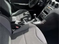 Usado Peugeot 308 SW Active 112 CV (82 kW) 2013 Granate Familiar