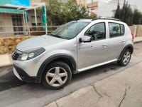 Usado Dacia Sandero Stepway 84 CV (61 kW) 2012 Gris Utilitario