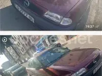 Usado Opel Astra Club 68 CV (50 kW) 2000 Granate Berlina