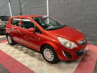 Usado Opel Corsa Essentia 85 CV (62 kW) 2011 Naranja Utilitario