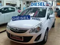 Używany Opel Corsa Expression 75 KM (55 kW) 2013 Biały Sedan/Limuzyna