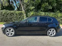 Usado BMW 116 116 CV (85 kW) 2005 Negro Utilitario