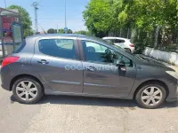 Usado Peugeot 308 90 CV (66 kW) 2009 Gris / plata Berlina