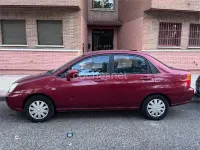 Usado Suzuki Liana 103 CV (75 kW) 2004 Rojo Berlina