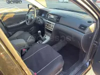 Usado Toyota Corolla Sol 110 CV (80 kW) 2004 Negro Berlina