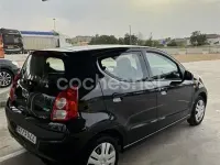 Usado Nissan Pixo Acenta 68 CV (50 kW) 2010 Negro Utilitario