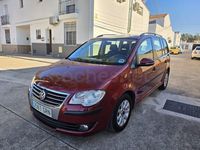 Usado VW Touran Advance 105 CV (77 kW) 2010 Granate Monovolumen