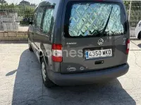 Usado VW Caddy 105 CV (77 kW) 2009 Gris / plata Monovolumen