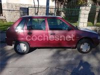 Usado Citroën AX Tonic 58 CV (42 kW) 1996 Granate Utilitario
