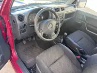 Usado Suzuki Jimny 85 CV (62 kW) 2013 Granate SUV