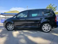 Usado VW Touran Highline 140 CV (102 kW) 2006 Negro Monovolumen