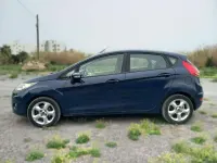 Usado Ford Fiesta Trend 70 CV (51 kW) 2010 Azul Utilitario