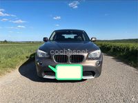 Używany BMW X1 177 KM (130 kW) 2011 Brązowy SUV