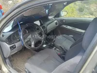 Usado Nissan Almera Tekna 98 CV (72 kW) 2003 Marrón Berlina