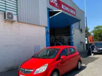 Usado Opel Corsa Cosmo 85 CV (62 kW) 2010 Rojo Utilitario