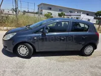 Usado Opel Corsa Essentia 85 CV (62 kW) 2010 Gris / plata Utilitario