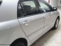 Käytetty Toyota Corolla 97 HP (71 kW) 2003 Harmaa Viistoperä
