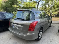 Usado Peugeot 308 SW 90 CV (66 kW) 2010 Gris / plata Familiar