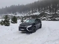 Usado Mitsubishi Outlander P-HEV 203 CV (149 kW) 2015 Negro SUV