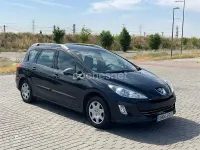 Usado Peugeot 308 SW 110 CV (80 kW) 2010 Gris / plata Familiar