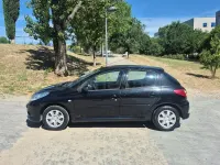 Usado Peugeot 206 60 CV (44 kW) 2009 Negro Berlina