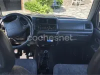 Usado Suzuki Jimny 80 CV (58 kW) 1999 Granate SUV