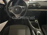 Usado BMW 118 122 CV (89 kW) 2007 Negro Utilitario