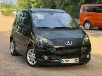 Usado Peugeot 1007 110 CV (80 kW) 2006 Negro Monovolumen