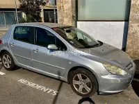 Usado Peugeot 307 90 CV (66 kW) 2004 Gris / plata Berlina