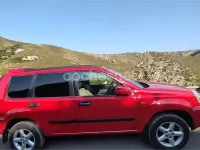 Käytetty Nissan X-Trail 114 HP (83 kW) 2003 Punainen Katumaasturi