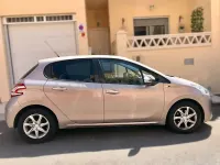 Usado Peugeot 208 Style 82 CV (60 kW) 2014 Gris Utilitario