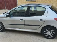Usado Peugeot 206 75 CV (55 kW) 2001 Gris / plata Berlina