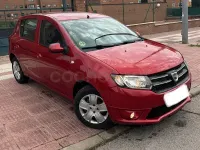 Używany Dacia Sandero Lauréate 90 KM (66 kW) 2013 Czerwony Sedan/Limuzyna