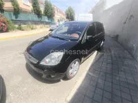 Usado Ford Fiesta 68 CV (50 kW) 2006 Negro Utilitario