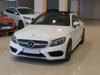 Używany Mercedes C220 170 KM (125 kW) 2017 Biały Coupe