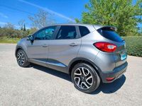 Usado Renault Captur Intens 90 HP (66 kW) 2015 Cinzento SUV